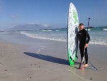 Trying a bit of stand up paddle surfing... its not quite the Thames!