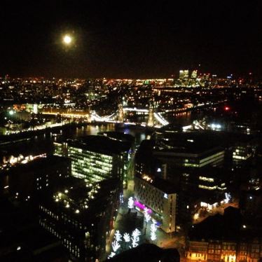 View over London Bridge at full moon from our 23rd anniversary dinner table!